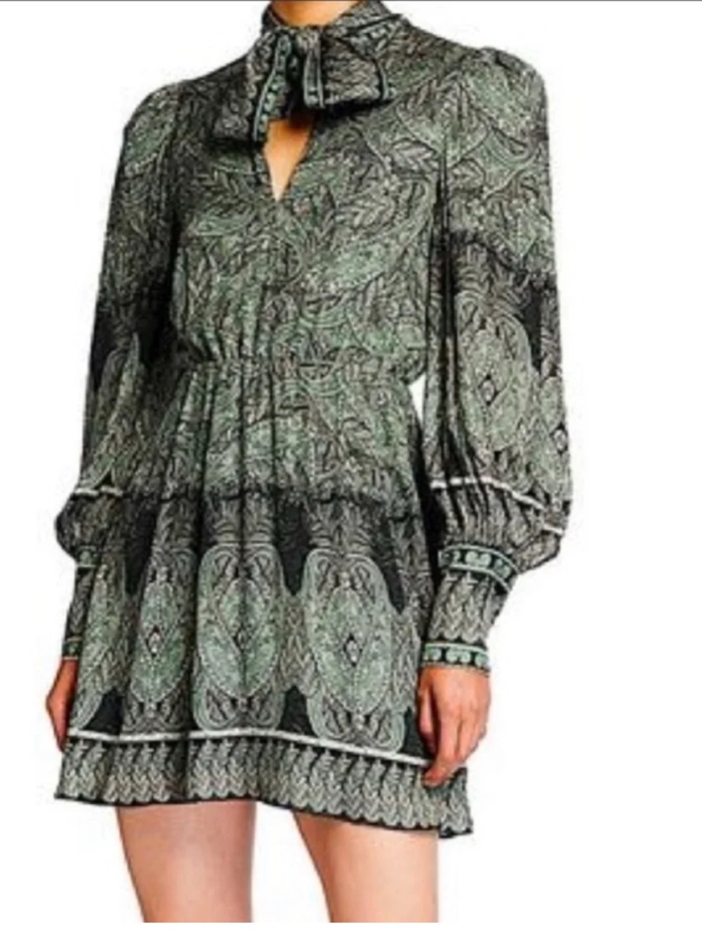 Alice + Olivia Tanisha Tie-Neck Mini Dress in a green and black paisley print,